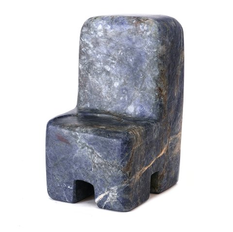 Poul Isbak. b. 1943, sculpture in the shape of a chair made of blue African granite. Signed and dated 1998. H: 23cm